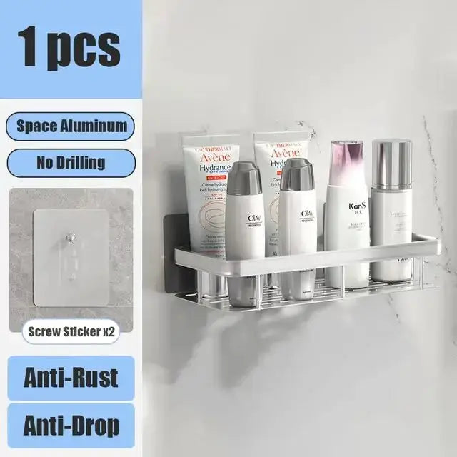 Silver stainless steel corner shelf with two tiers, mounted on a wall using self-adhesive strips.