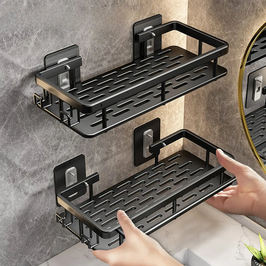 Black stainless steel corner shelf with two tiers, mounted on a wall using self-adhesive strips.