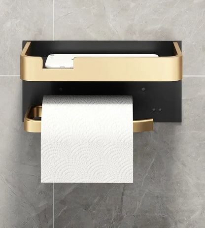 Front view of Toilet Paper Roll Holder Phone Shelf in gold and black, showing compact design and wall-mounted setup.