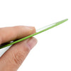 Hand holding a slim, green DIY tile cutting disc designed for precise and clean cuts in various materials.